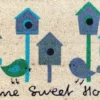 Tapi brosse coco beige imprimé maisons à oiseaux bleu Sweetsol - 75 x 45 cm
